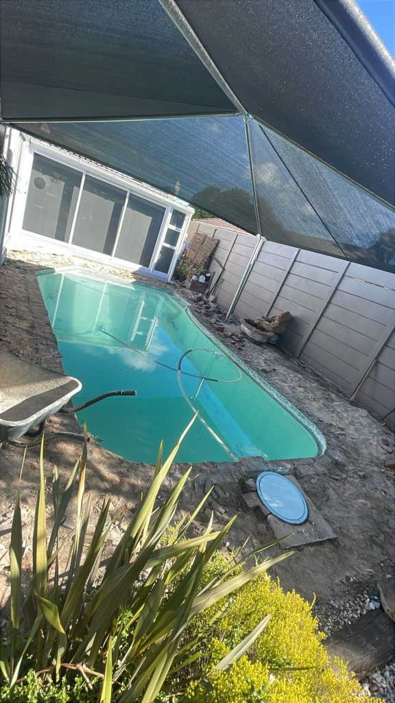 Bare pool shell before coping and paving work begins