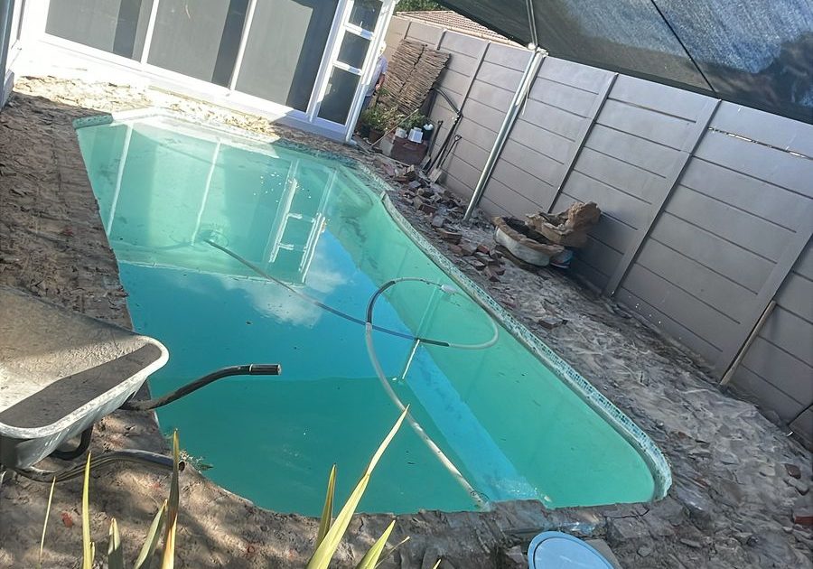 Bare pool shell before coping and paving work begins