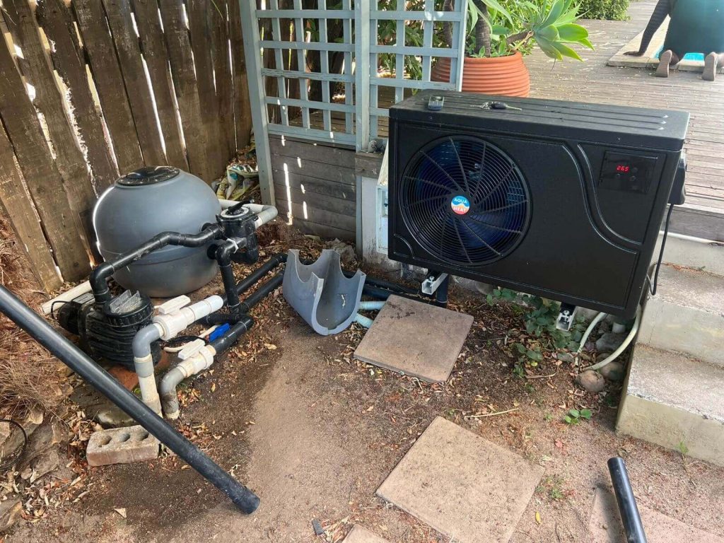 "Fully installed swimming pool heat pump system in Somerset West for energy-efficient pool heating."