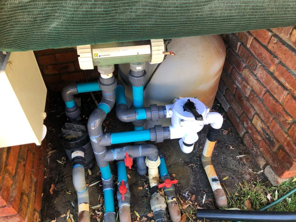 Pump pit with pipe unions, ball valves and fittings around the filter, the usual places a slow leak starts
