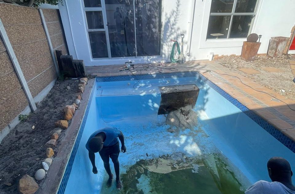 Close-up of fibreglass pool step repair in Da Gama showing smooth resurfacing work