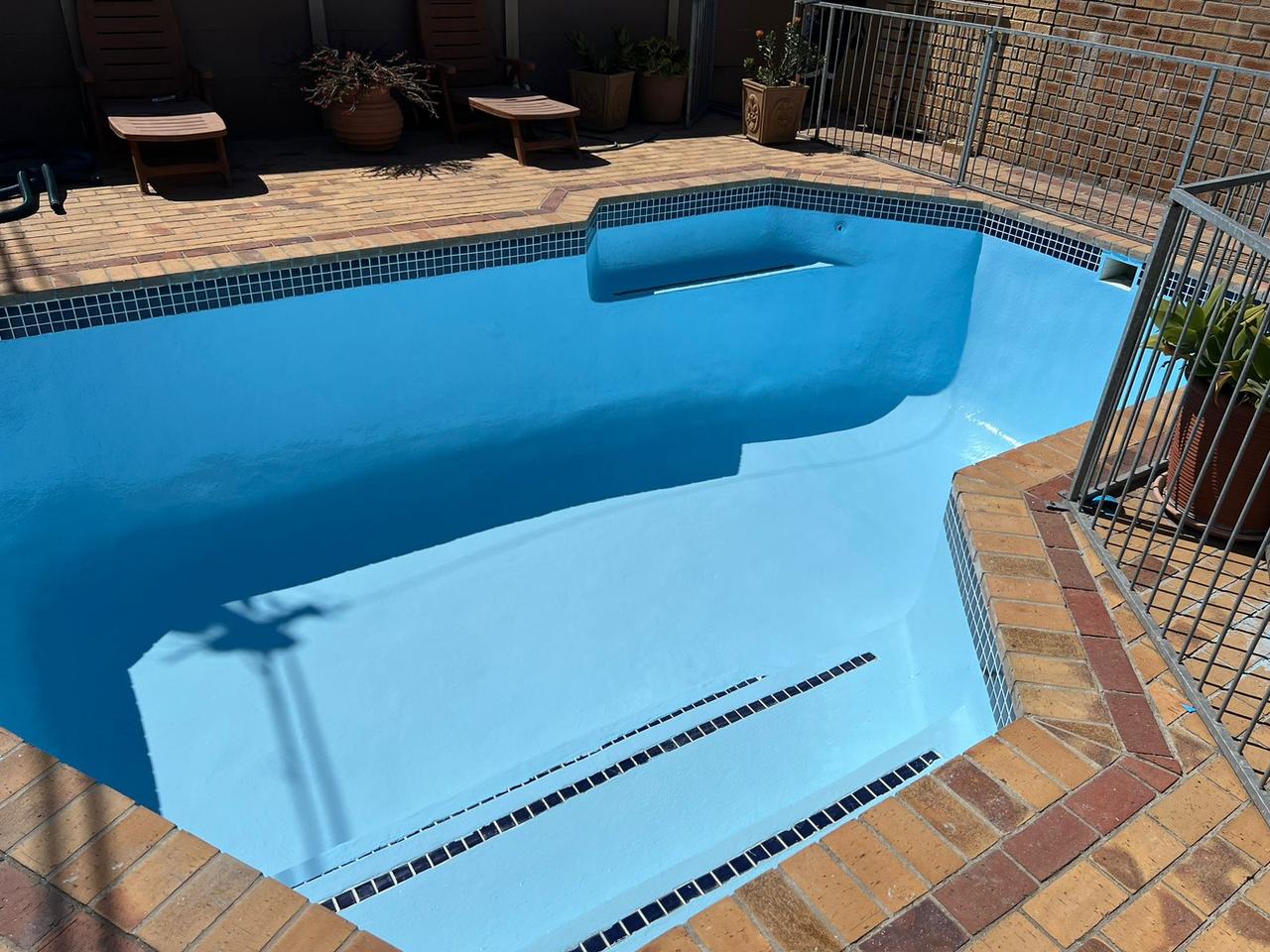 A stunning fibreglass pool revitalized in Durbanville, Northern Suburbs, Western Cape, with a complete revamp. The transformation includes resurfacing, repairs, and a sleek new finish, ensuring a smooth, durable, and low-maintenance surface. This upgrade enhances the pool's appearance and longevity, making it an ideal choice for homeowners seeking a modern, energy-efficient, and visually appealing outdoor space.