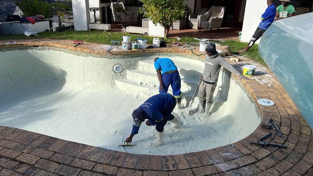 Cracked marbelite pool being resurfaced with white marbelite in Cape Town