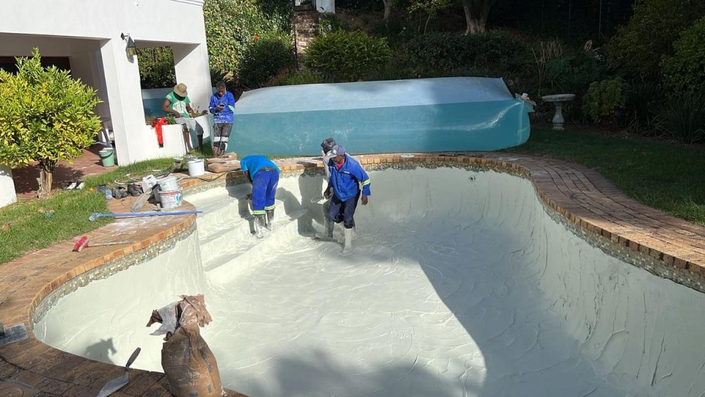 Alt text: Gunite pool installation underway in Strand backyard