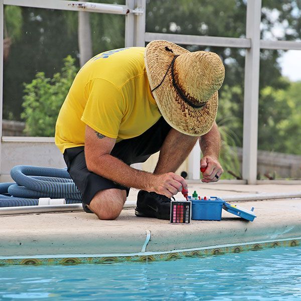 Cape Town pool expert checking water chemistry