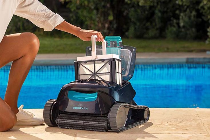 Modern robotic pool cleaner scrubbing the bottom of a sparkling blue pool in Cape Town – ideal for automated pool cleaning, servicing, and maintenance solutions