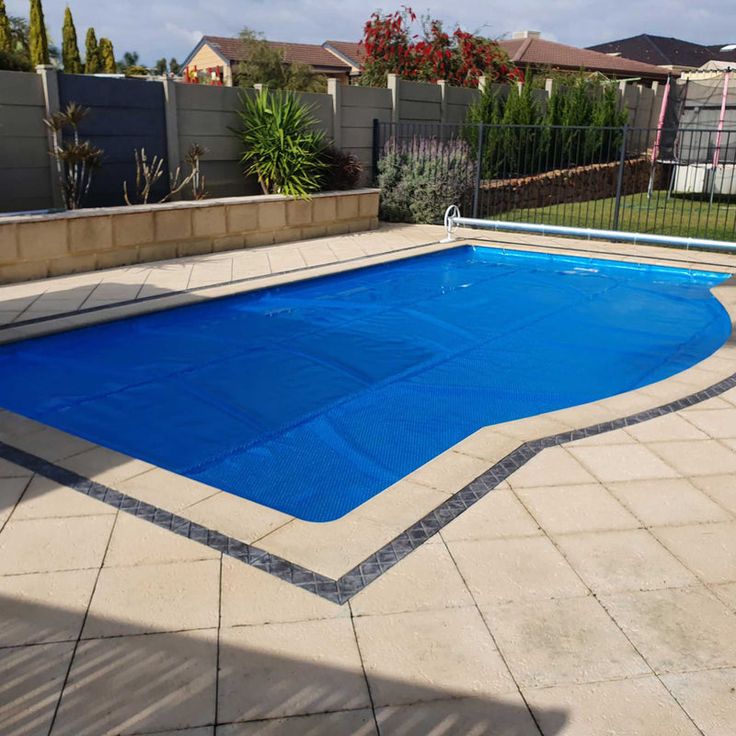 Cape Town eco pool with solar cover and filtration system.