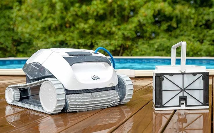 Robotic pool cleaner removing dirt from a tiled swimming pool in Cape Town – ideal for low-maintenance, energy-efficient pool cleaning solutions