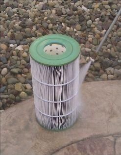 Pool filter cleaning by professional technician