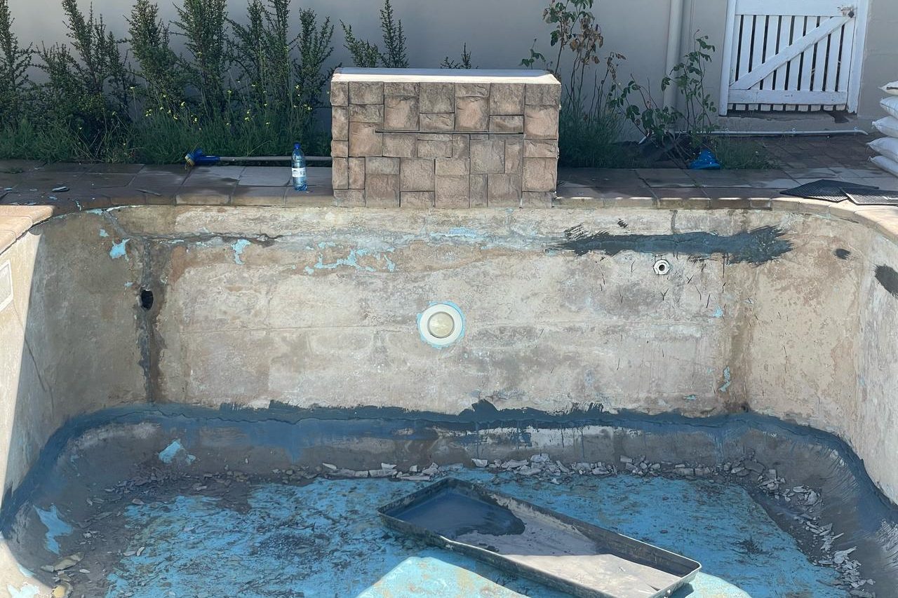 Diagram of swimming pool crack types including surface and structural cracks