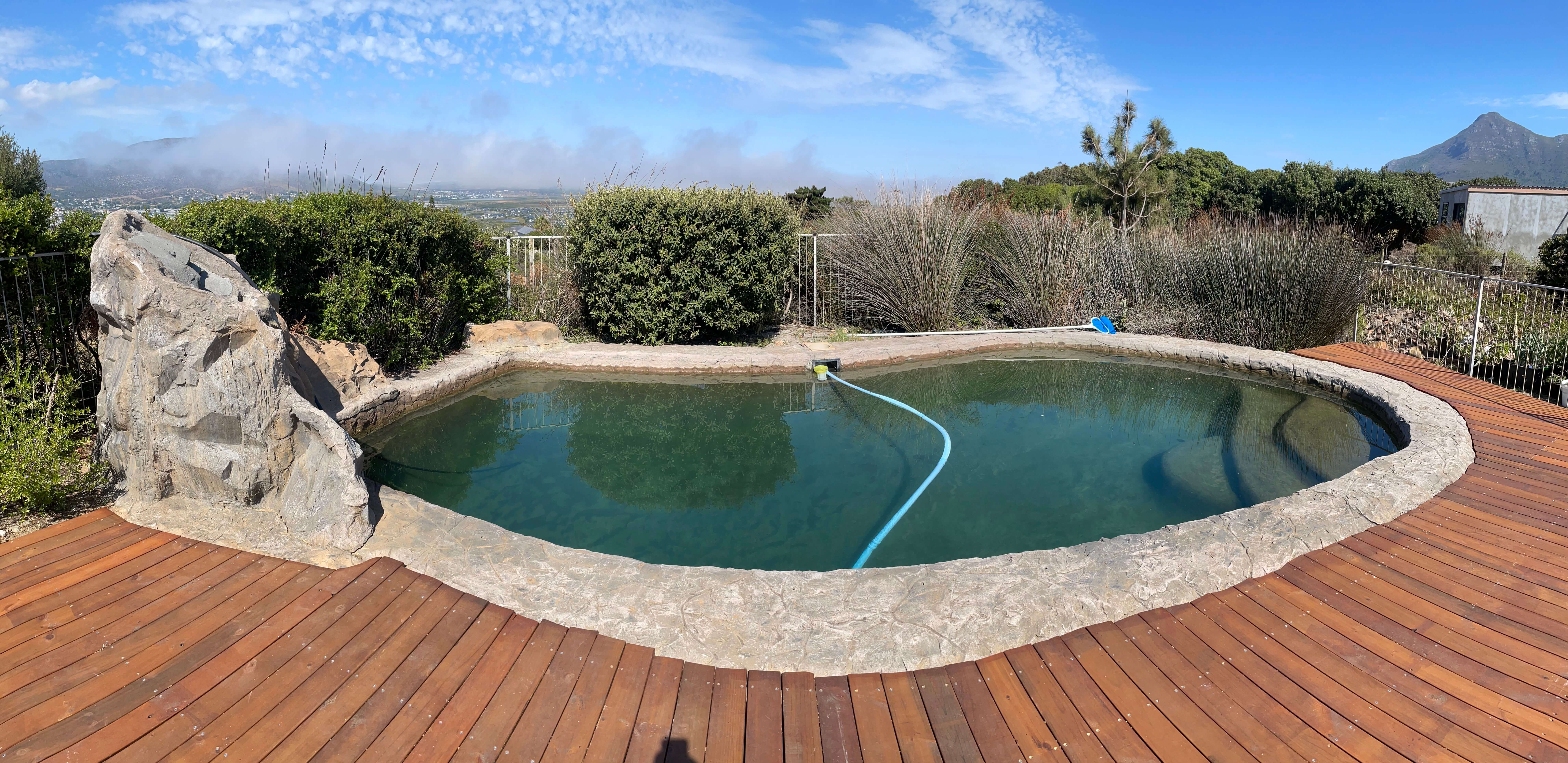 Composite pool decking installation in a Cape Town backyard.