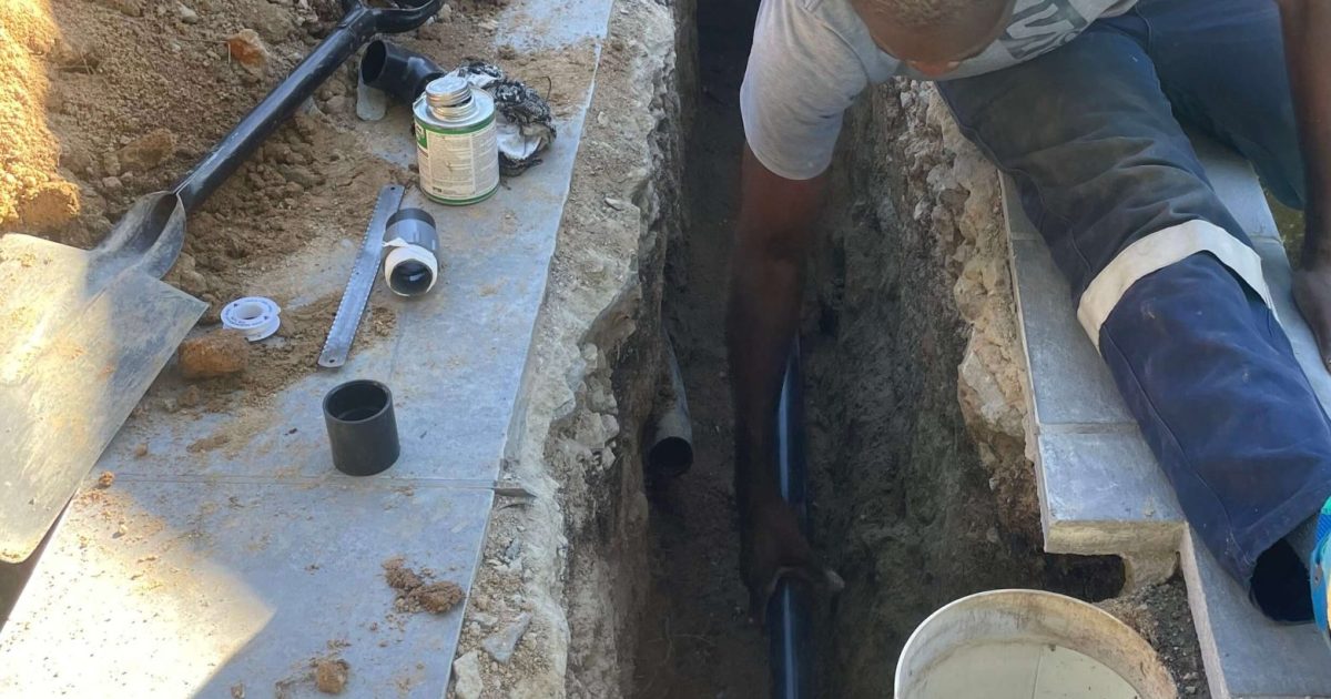 Swimming pool technician fixing a leaking Skimmer box Langebaan
