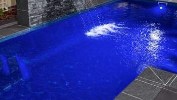 Pool colour finish options for Cape Town renovations Cape Town swimming pool with dark blue colour finish upgrade