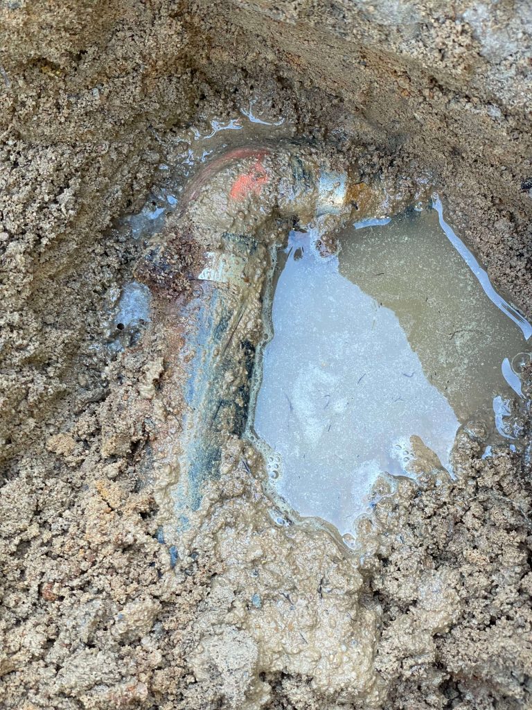 Repairing underground plumbing pipe leak for swimming pool