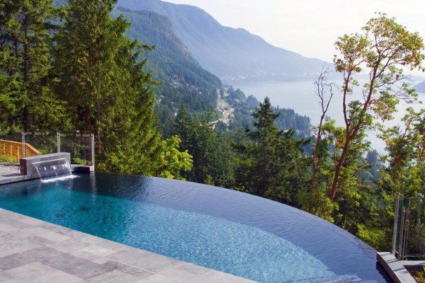 Modern swimming pool installation in Cape Town with scenic mountain view
