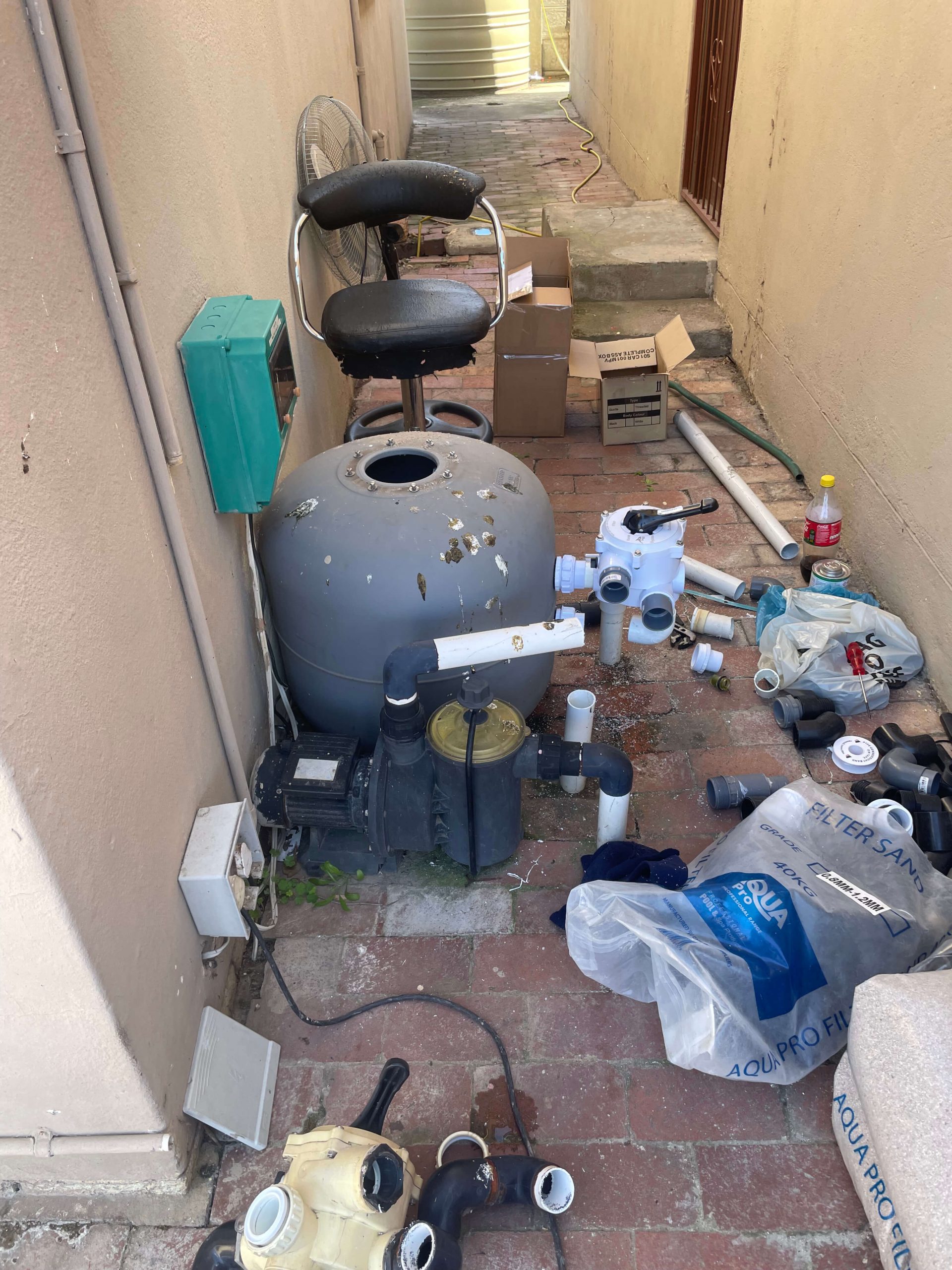 Technician replacing a damaged sand filter selector valve in Cape Town