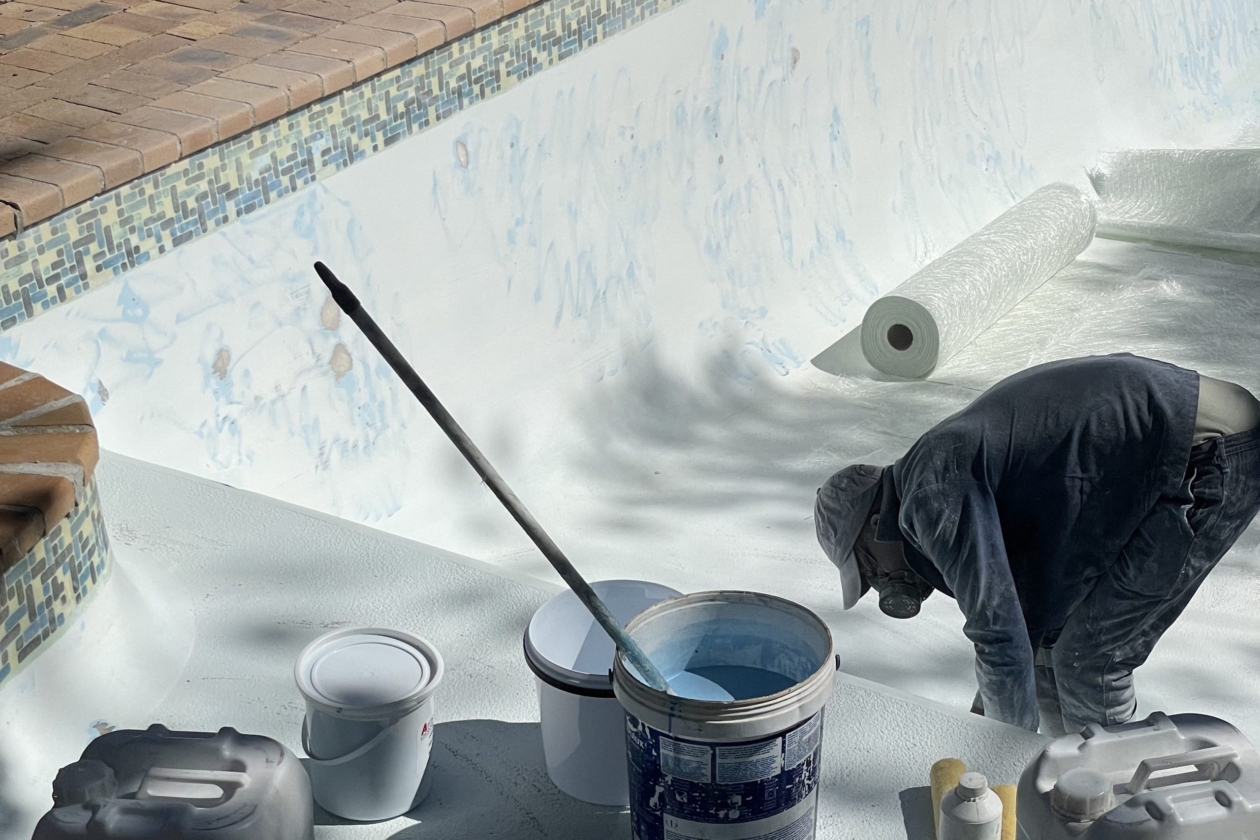 Pools Reno Cape Town technicians performing pool maintenance and filter cleaning service