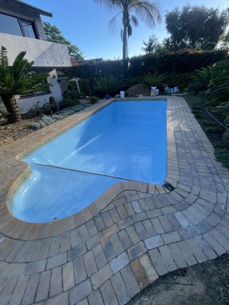 Before and after fibreglass pool relining project in Stellenbosch, Western Cape