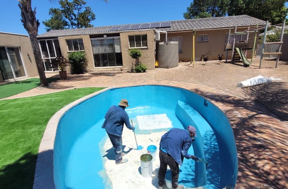 Fibreglass lining of a residential swimming pool in Bishopscourt completed by Pools Reno, showcasing a smooth modern finish