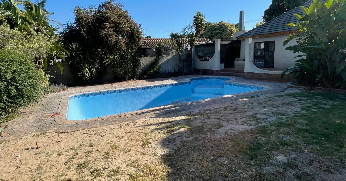 Old marbelite swimming pool expertly refurbished and fibreglass lined by Pools Reno in Cape Town, featuring a smooth, watertight finish and renewed modern look.