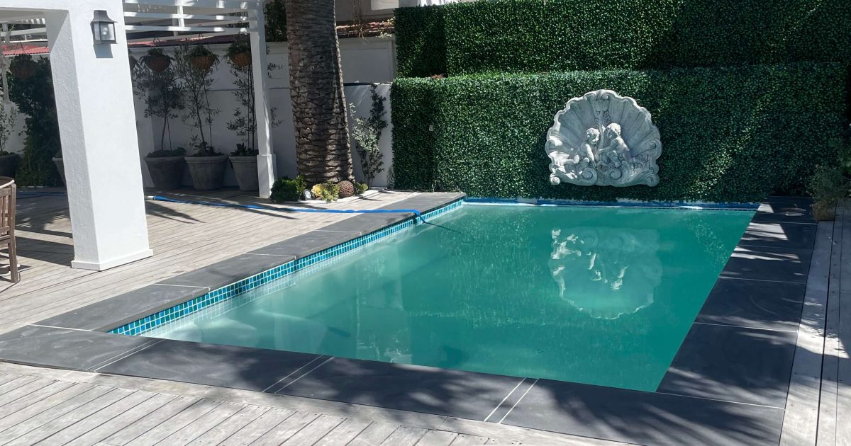 Completed ceramic mosaic tiling on a fibreglass lined concrete pool after professional renovation in Cape Town