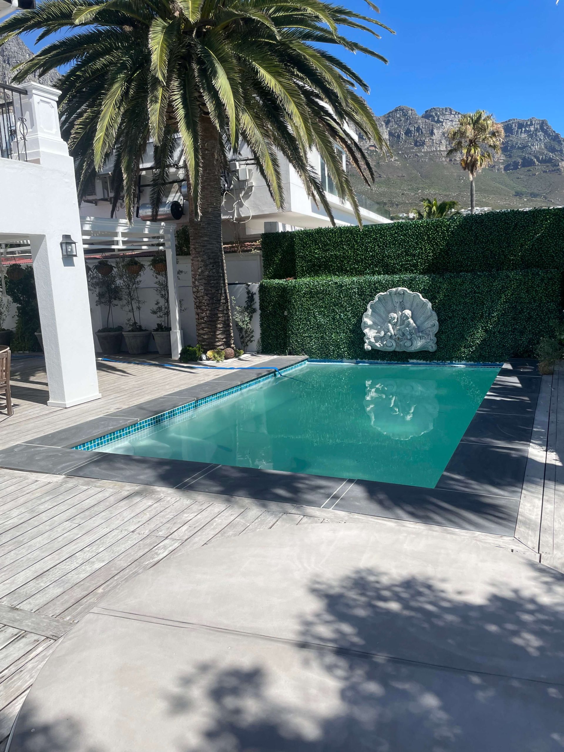 Completed ceramic mosaic tiling on a fibreglass lined concrete pool after professional renovation in Cape Town