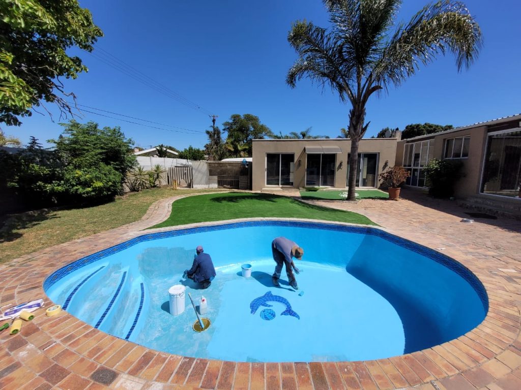 Freshly painted swimming pool after fibreglass lining and surface preparation, completed as part of a Cape Town pool renovation