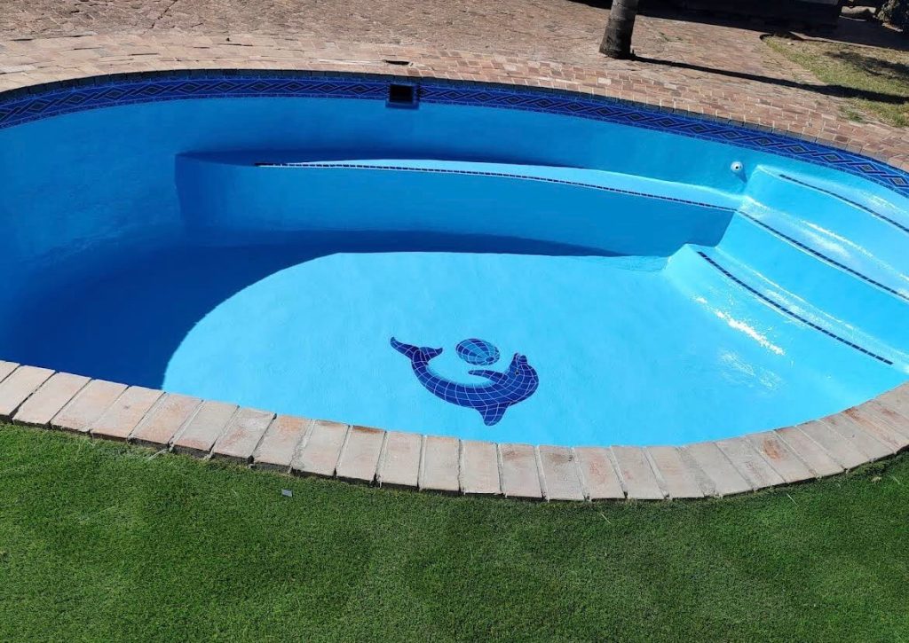 Fully renovated concrete swimming pool featuring fibreglass lining, tissue mosaic installation, and professional pool painting in Cape Town