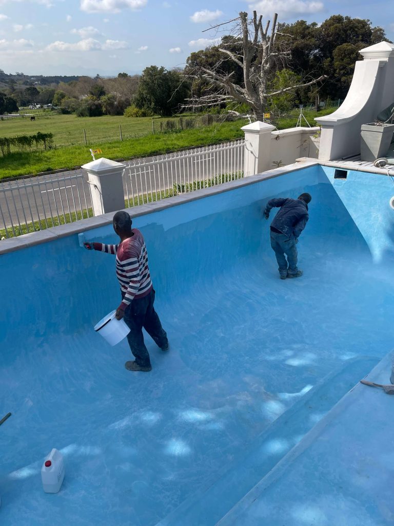 Swimming pool in Camps Bay professionally fibreglass lined and painted to restore a smooth, durable finish by Pools Reno