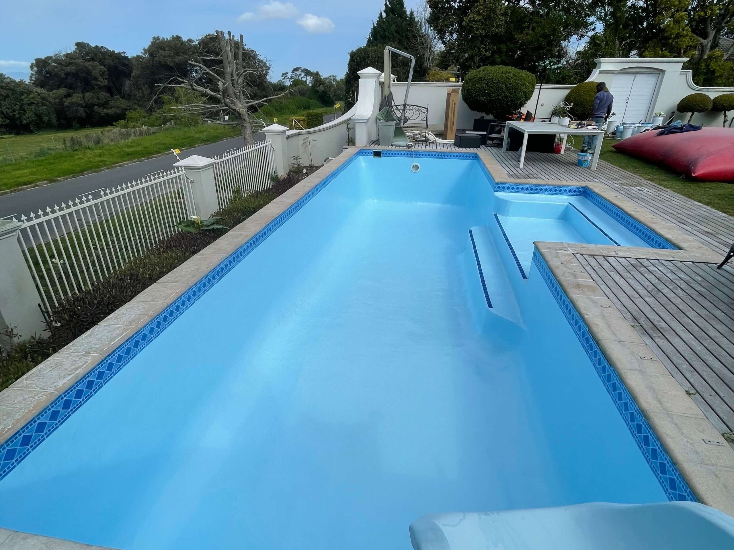 Swimming pool in Tokai professionally relined with fibreglass to restore a smooth, waterproof finish by Pools Reno