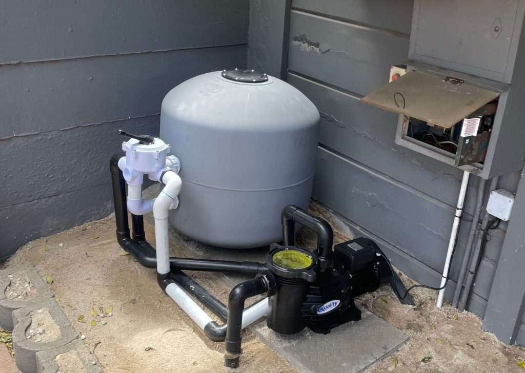 Upgraded swimming pool filtration system with new pump, sand filter and plumbing installation in Cape Town South Africa