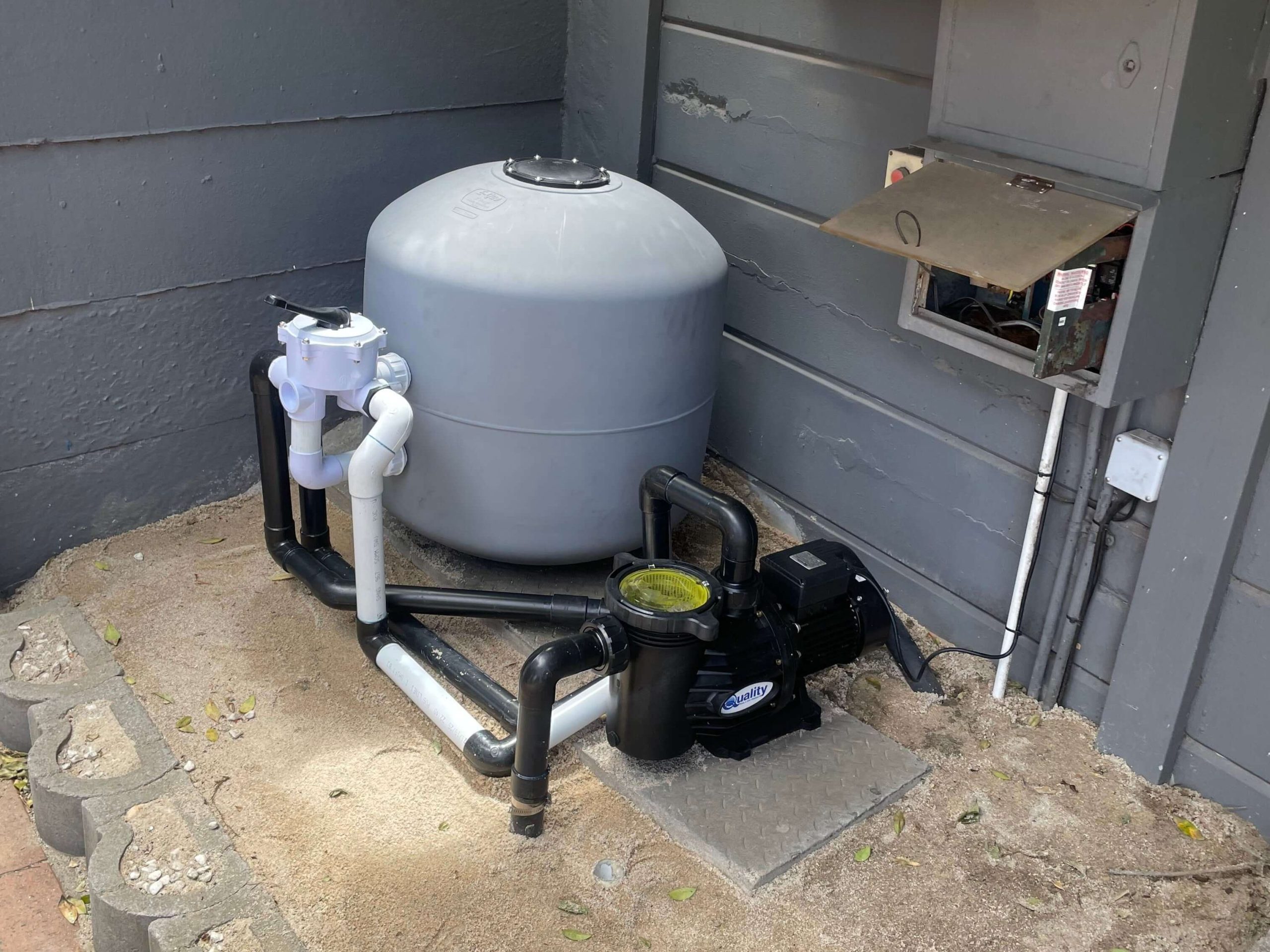 Swimming pool filtration system upgraded to a 1.6kW pump and 5-bag sand filter to improve water circulation, filtration efficiency, and clarity by Pools Reno