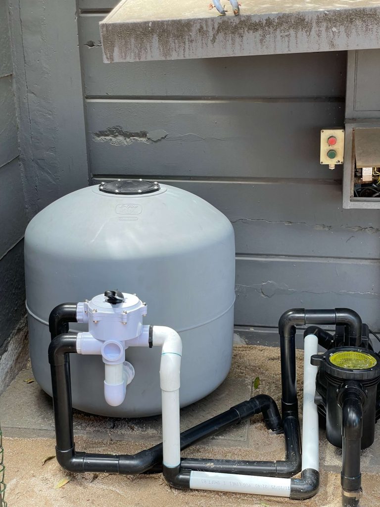 Swimming pool filtration system upgraded from a 1.1kW pool pump to a 1.6kW pump and from a 4-bag sand filter to a 5-bag filter for improved circulation and water clarity, installed by Pools Reno