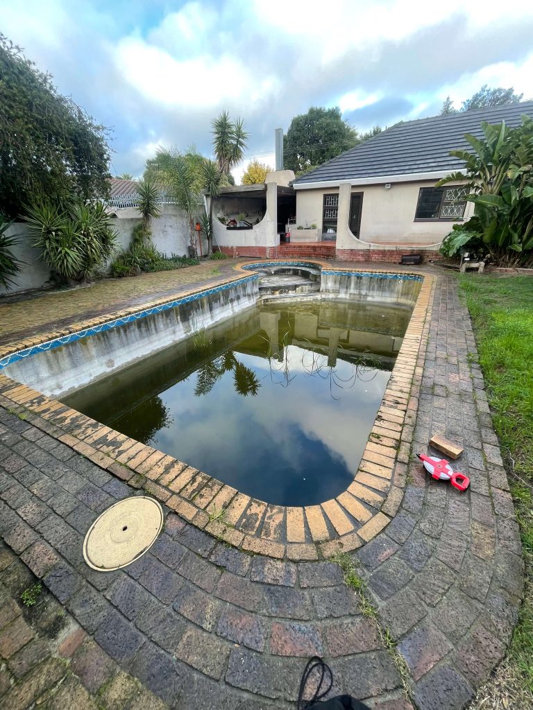 Ageing concrete pool Bellville before resurfacing process