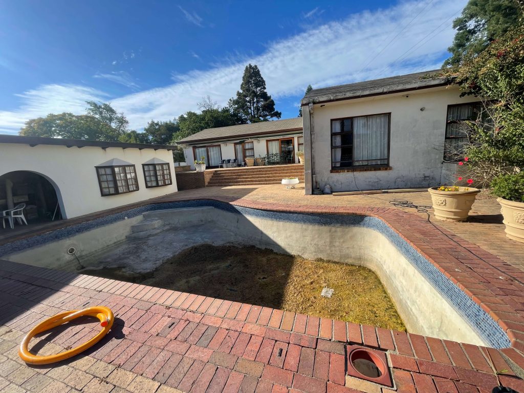 old concrete swimming pool Pinelands before fibreglass relining cracked worn surface