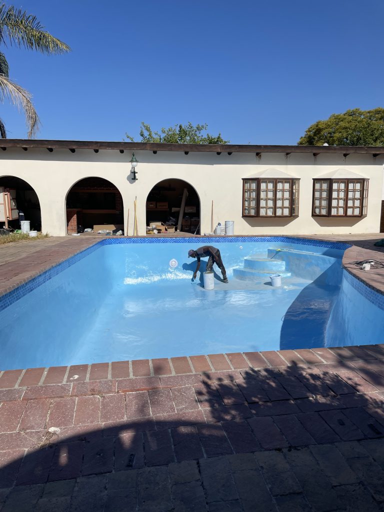 pool painting after fibreglass relining Pinelands smooth coating application