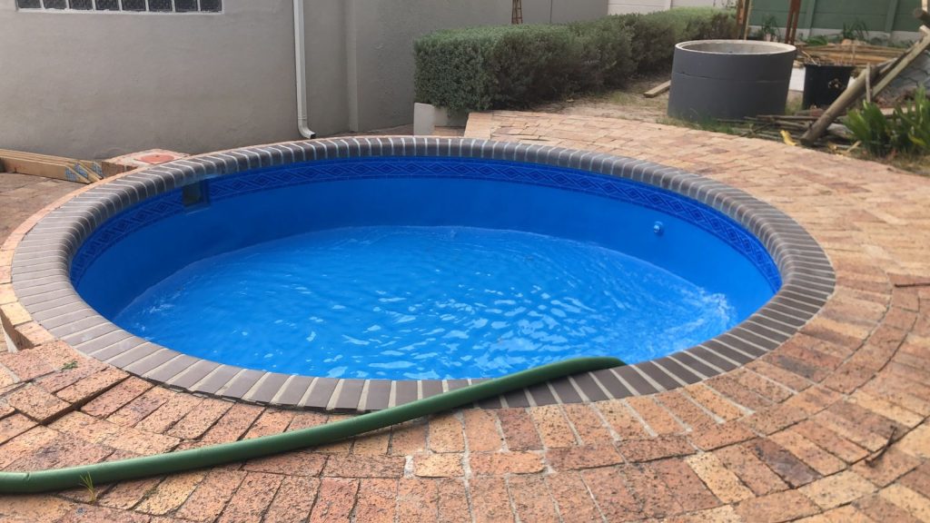pool painting after fibreglass relining Edgemead Cape Town smooth finish