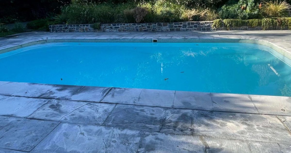 Sparkling clean marbelite swimming pool after professional repair showing smooth blue surface and clear water in Cape Town