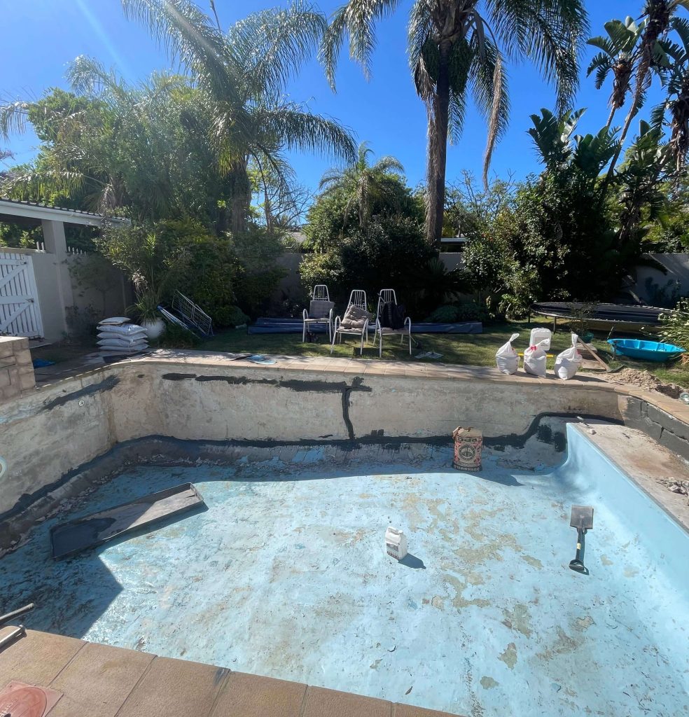 Pool surface preparation and crack repair prior to fibreglass relining in Langebaan