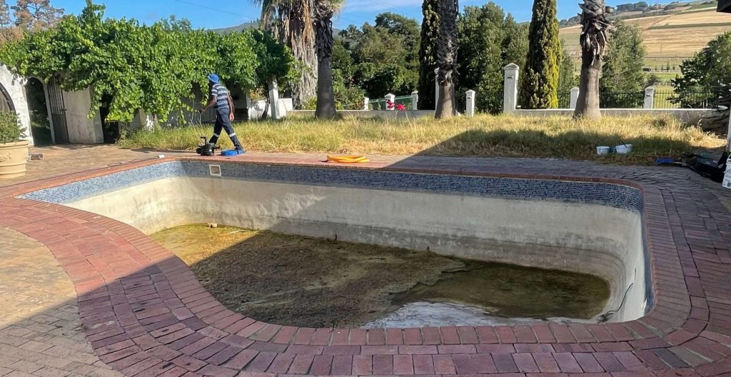 Old marbelite swimming pool before fibreglass renovation in Cape Town