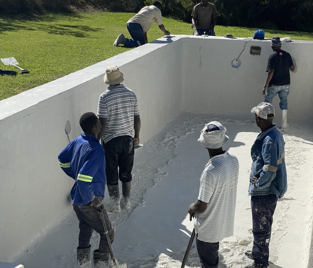 Swimming pool in Durbanville undergoing professional marbelite resurfacing with fresh surface application during renovation by pool specialists