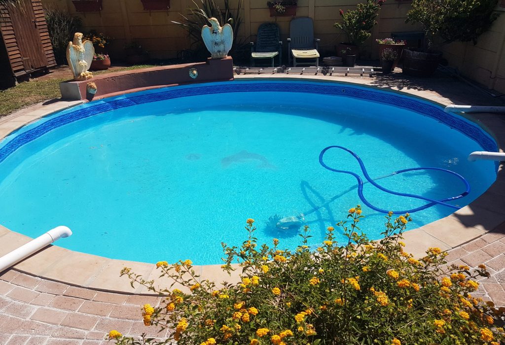 Newly renovated swimming pool in Riebeek-Kasteel with modern fibreglass finish, sparkling blue water, upgraded coping and stylish outdoor entertainment area by Pools Reno Western Cape