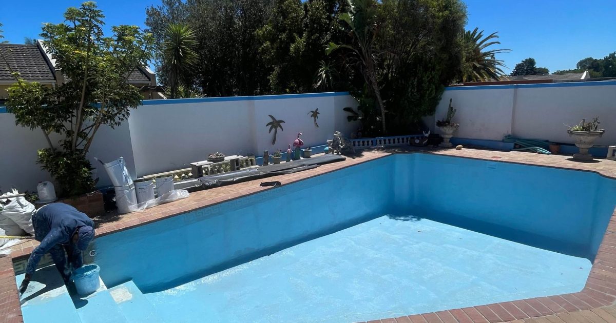Professionally renovated swimming pool in Malmesbury with modern fibreglass finish, sparkling blue water, upgraded coping and stylish outdoor entertainment area by Pools Reno Western Cape