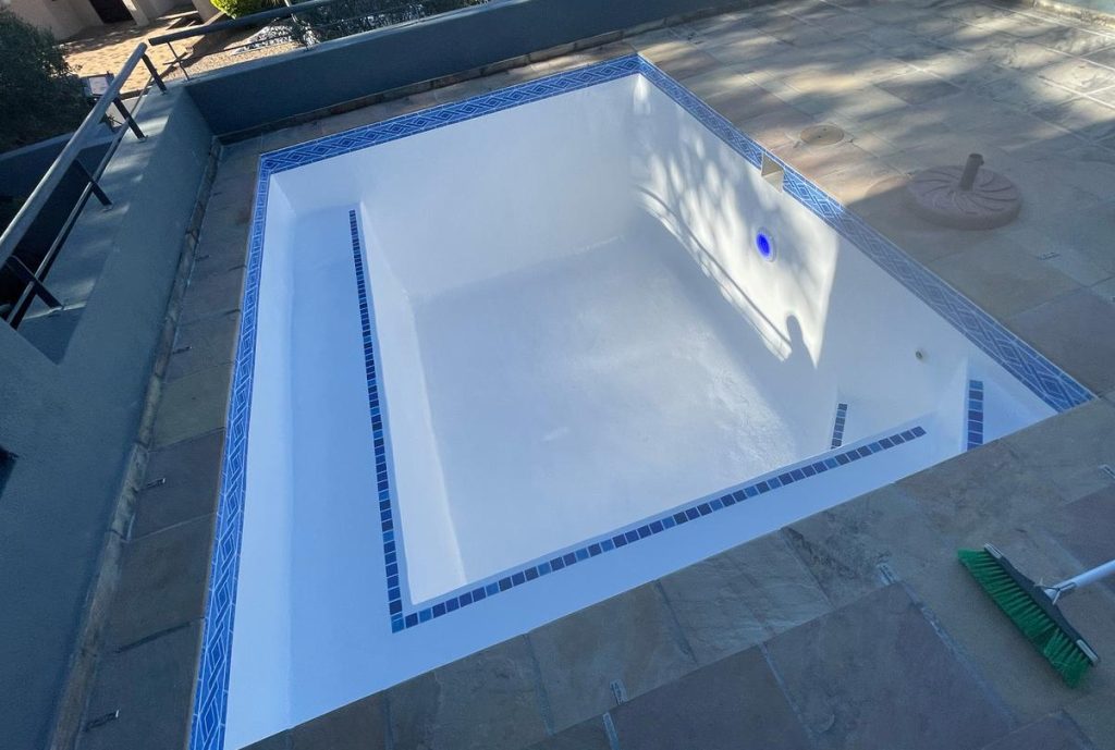"Fully renovated smooth white fibreglass lined swimming pool in Darling Western Cape modern finish"