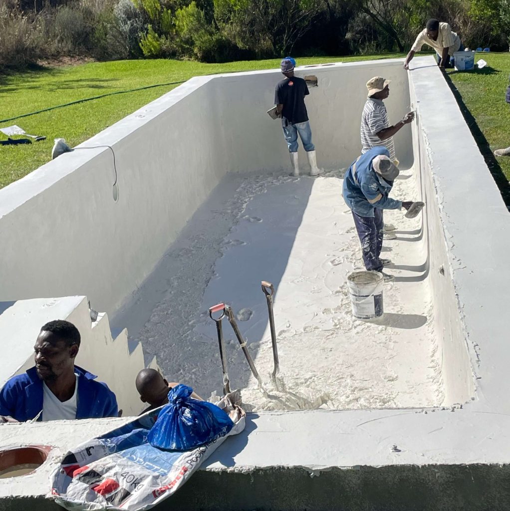 Fresh marbelite resurfacing process on gunite swimming pool in Yzerfontein