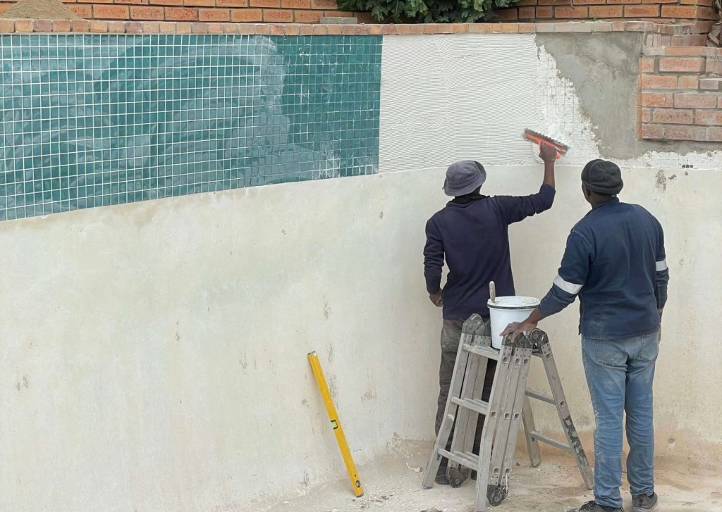 Luxury tiled swimming pool renovation with mosaic tiles in Yzerfontein Western Cape