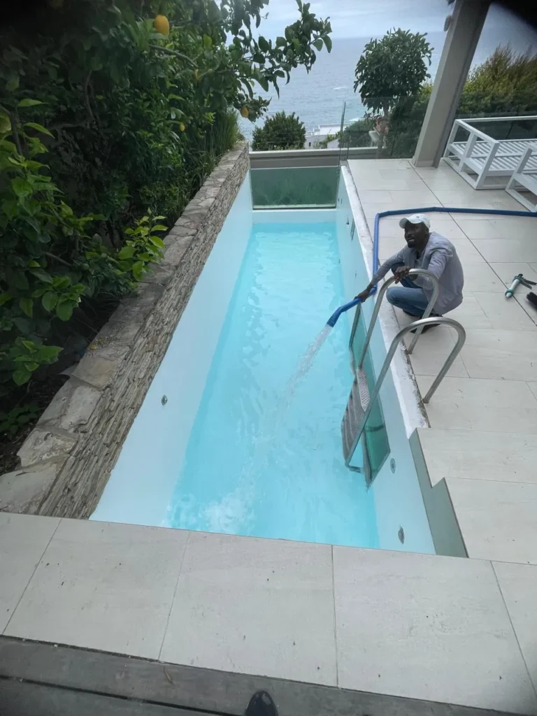 Finished lap pool filling with water after the fibreglass lining and new pool coat